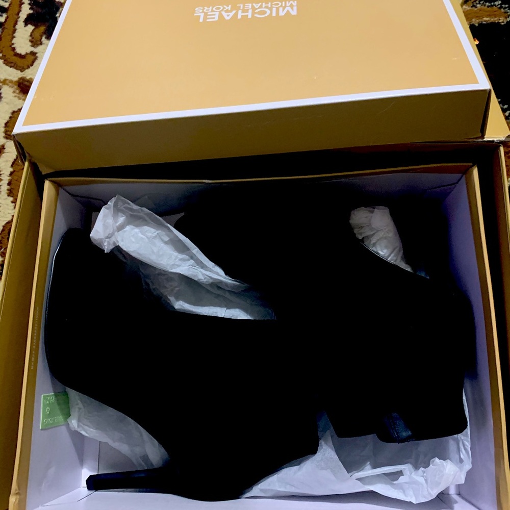 Brand New Michael Kors peep toe ankle booties.